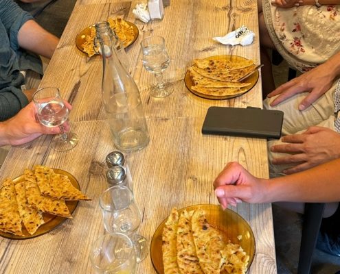 French language school in Nice with students tasting food